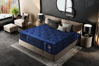 Blue mattress on a bed in a stylish bedroom with decor elements.