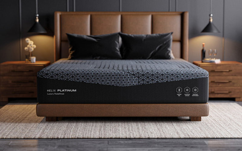 Helix Platinum mattress on a leather platform bed, front view