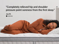 Side sleeper resting on a Leesa Legend Chill Hybrid mattress beside a verified customer review about hip and shoulder pressure relief