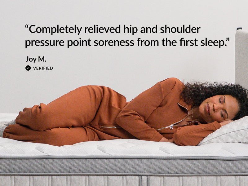 Side sleeper resting on a Leesa Legend Chill Hybrid mattress beside a verified customer review about hip and shoulder pressure relief